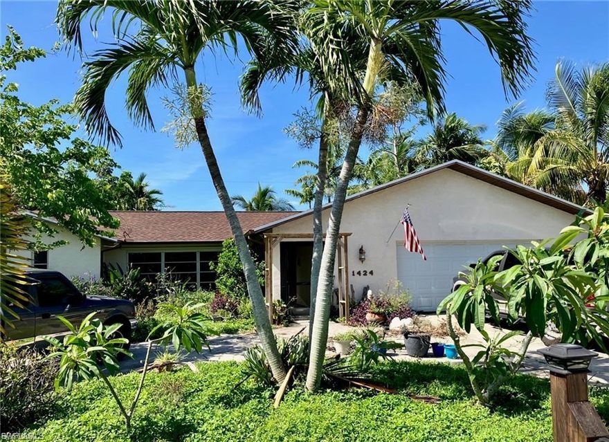 Welcome to this spacious 3-bedroom, 2-bathroom home offering 1,711 sq ft of living space, perfect for comfortable living and entertaining. This property features a double garage with its own door and window, creating an excellent opportunity to convert the space into a game room, guest suite, or efficiency for additional rental income.

Situated on an oversized lot, the home offers plenty of outdoor space to relax and enjoy nature. The yard is filled with beautiful fruit trees, creating a peaceful and private environment ideal for gatherings, gardening, or simply unwinding.

Additional highlights include a durable vinyl fence for added privacy and security, all assessments paid, and the property is not located in a flood zone, providing extra savings and peace of mind.

This home offers a fantastic combination of space, flexibility, and investment potential. Don't miss the opportunity to make it yours!