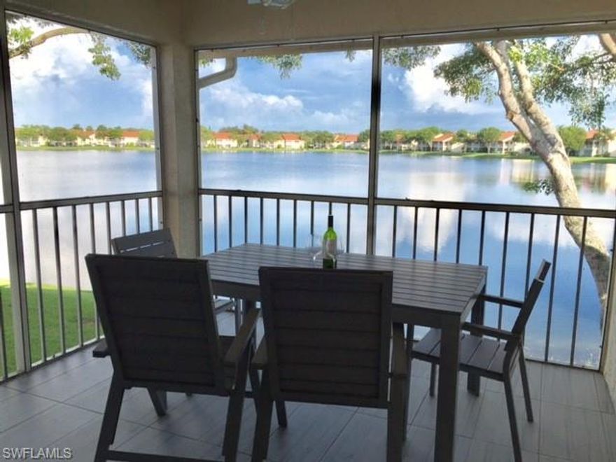Furnished annual rental. Rarely available end-unit with extra windows and covered parking space. This lake front 2nd floor unit offers new appliances, furniture, laundry inside the unity, lots of cabinets and sunset view from screened lanai. Desirable North Naples location, close to new Mercato, only 4 miles to the beach, walking distance to the shops, restaurants and the public library. Amenities at Emerald Lakes include 2 heated pools, tennis courts, BBQ, bocce ball clubhouse with exercise room, billiards and social events.