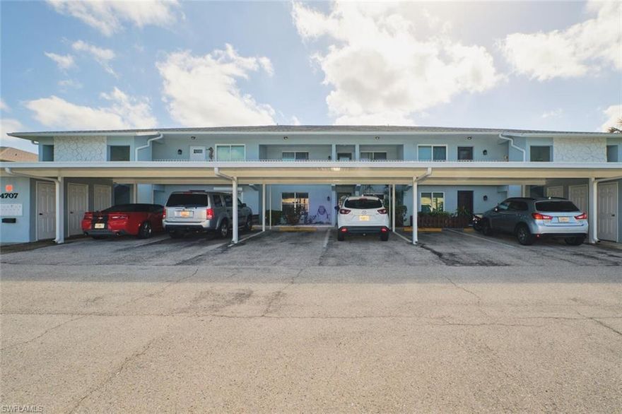 UNBELIVABLE LOW PRICE for a spectacular GULF ACCESS WIDE BASIN VIEW on the RUBICON Canal — one of the most desirable waterfront settings in Cape Coral. This FIRST-FLOOR 2 Bedroom + DEN  offers GULF ACCESS, an unbeatable downtown location, and the kind of water view that truly sets it apart.   The open layout features NEW FLOORING! Luxury vinyl in living areas and bedroom, crown molding, and decorative NEW wainscotting on newly painted walls.  NEW ROOF, new Covered Parking and NEWLY PAINTED.  The UPDATED kitchen features white cabinetry, decorative backsplash, Tile, raised ceiling detail, and a BUILT-IN COFFEE or BAR cabinet with wine refrigerator — perfect for entertaining. The open-concept layout connects seamlessly to the spacious screened lanai, where sliding glass doors frame the heated pool and expansive canal basin beyond. This is indoor-outdoor Florida living at its best.  The split-bedroom floor plan provides privacy for guests, each bedroom is on a separate hallway.  The primary suite offers crown molding, lanai access, and a private bath with separate sink area PLUS a sink area in the main bath.  The den/flex room functions beautifully as a home office, media room, or overflow guest space — giving you the versatility. A full laundry room inside the unit adds everyday convenience.
A separate interior laundry room adds convenience, and you’ll appreciate outdoor storage plus multiple closets throughout the unit, making seasonal or full-time living comfortable and practical. 
Lanai has Roll-Down SHUTTERS for protection and privacy! Watch the BOATS from your private lanai.    Major bonus: Impact hurricane-rated entry door already installed and BRAND NEW hurricane windows in process, offering storm protection, potential insurance savings, and peace of mind. 
Well-maintained community with Gulf access,  HEATED waterfront pool, seawall, and community dock. Covered parking and an exterior storage closet are just steps from your front door. Lovely garden area in front of the unit offers a place for plants or extra seating. Location truly sets this property apart. Situated in the heart of Downtown Cape Coral, you are walking distance to popular restaurants, waterfront dining, coffee shops, boutique shopping, live music venues, farmers markets, and city festivals. The revitalized Bimini Basin area and The Cove at 47th continue to elevate this neighborhood, making it one of the most active and desirable areas in the city. Enjoy dinner by the water, evening cocktails, weekend events, and holiday celebrations in downtown Cape Coral. Wide basin views. Gulf access. Downtown location. First-floor convenience. This is waterfront living done right.