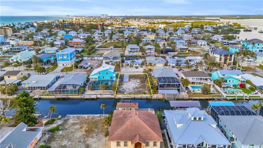 BOATER'S PARADISE! Highly Sought-After Canal-Front Lot on the South End of Fort Myers Beach. This is your opportunity to create your dream oasis on this highly sought-after 60' x 125' canal-front lot. Perfectly positioned in the idyllic south end of Fort Myers Beach. This gem offers a blank canvas to design and build the waterfront home you’ve always envisioned. Nestled along a serene canal, this property is a boater's paradise with direct access to the Gulf of Mexico—perfect for days spent cruising, fishing, or exploring nearby islands. Imagine stepping from your backyard onto your boat and embracing the ultimate Florida lifestyle. Just a short stroll to the sugar-white sands and stunning sunsets of Fort Myers Beach, this location combines the best of coastal living: tranquility, natural beauty, and convenience. The prime south-end location is cherished for its peaceful atmosphere, while still being close to the vibrant restaurants, shops, and entertainment options that make this community so beloved. This exceptional lot invites you to bring your vision to life, whether it’s a luxurious custom home or a private vacation retreat. With endless possibilities and an unmatched location, this is a rare chance to secure a piece of paradise. Property Highlights: Highly sought-after canal-front lot with Gulf access, Idyllic south end of Fort Myers Beach, Short stroll to the beach and breathtaking sunsets. Boater's dream with deep-water access. Prime location near dining, shopping, and entertainment. Don’t miss out on this extraordinary opportunity to build the home of your dreams in one of Fort Myers Beach's most desirable locations.