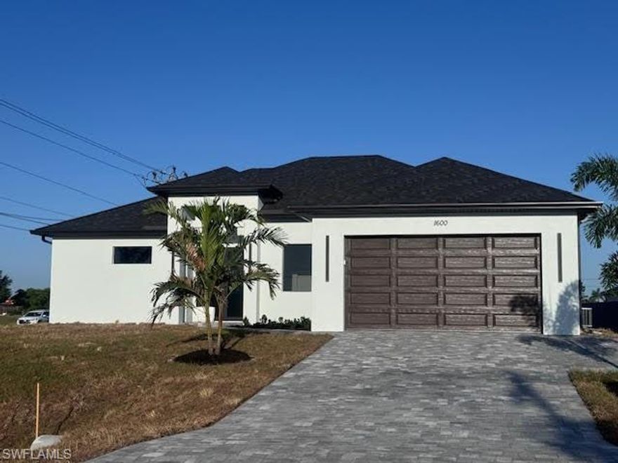 Welcome to your dream home in Cape Coral! This stunning single-family home boasts 3 bedrooms, 2 bathrooms, and a spacious 2-car garage. The modern office space is perfect for those who work from home or need a quiet place to study. The kitchen features beautiful QUARTZ counters, stainless steel appliances, and sleek tile flooring. With IMPACT WINDOWS AND DOORS, you can rest easy knowing your home is protected during storms. Enjoy the convenience of CITY WATER and the luxury of a TANKLESS WATER HEATER. The PORCELAIN TILE throughout the home adds a touch of elegance and is easy to maintain. Best of all, this new construction home is located in a NO-FLOOD ZONE, giving you peace of mind during hurricane season. Don't miss out on the opportunity to own this beautiful home in one of Cape Coral's most desirable neighborhoods. Schedule a showing today and make this house your forever home! SELLER MOTIVED!!!!