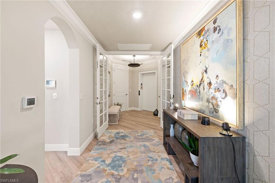 Step off your private elevator into one of Talis Park's most extraordinary residences — a third-floor penthouse designed by Troy Beasley of the acclaimed Beasley & Henley Interior Design, and offered turnkey furnished with only limited exclusions.
At 2,930 square feet, this three-bedroom-plus-den, three-and-a-half-bath condominium is finished at a level that simply has no equal among current Viansa offerings. Forge lighting fixtures, GE Monogram appliances, premium tile flooring throughout the main living areas and lanai, and fully pocketing sliders that open the great room completely to the outdoors — every detail reflects the intentionality of a professionally executed, designer-driven renovation.
The 700-square-foot wraparound lanai is the crown jewel, framing sweeping golf course views and providing an outdoor living experience that rivals the interior in quality and scale.
Two assigned parking spaces and a private storage locker convey with the residence.
Talis Park surrounds you with one of Southwest Florida's most celebrated lifestyle ecosystems — a Greg Norman and Pete Dye designed course ranked consistently among Florida's finest, the award-winning Vynehouse Clubhouse, Casa Cortese Grill, Fiona's Café, resort-style pool, full-service spa, fitness studio, tennis, pickleball, bocce, and beach transportation. Vanderbilt Beach, Mercato, and North Naples' best dining and shopping are minutes away.
This is a rare opportunity to own a truly turn-key, designer-finished penthouse in one of Naples' most sought-after communities.