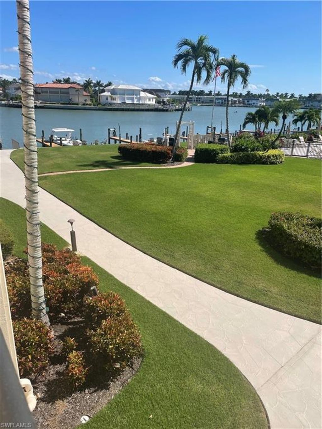 Photo of 3200 Gulf Shore Blvd N #204, NAPLES, FL 34103 (MLS # 225074547)