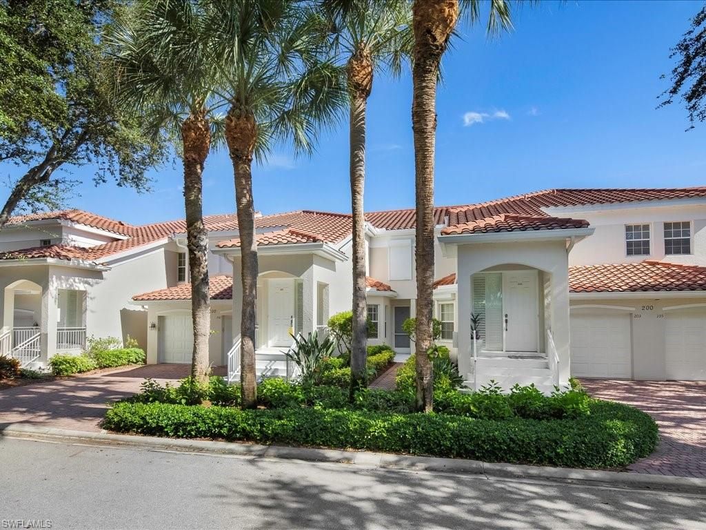 Photo of 200 L AMBIANCE CIR #102, NAPLES, FL 34108 (MLS # 225072818)