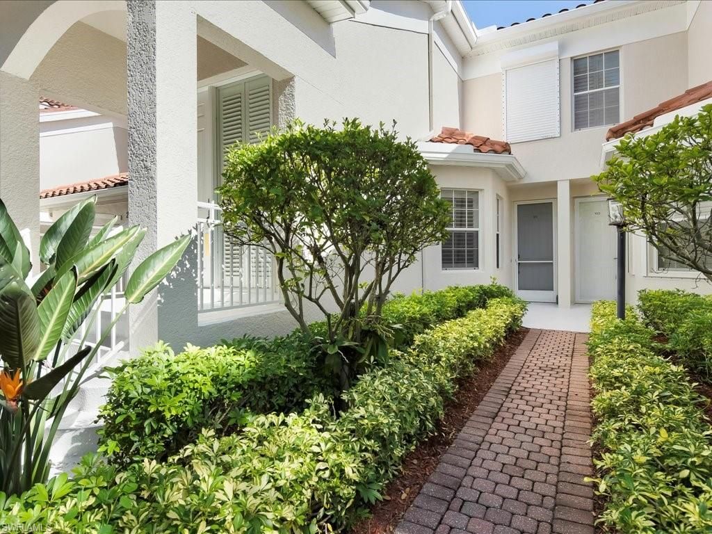 Photo of 200 L AMBIANCE CIR #102, NAPLES, FL 34108 (MLS # 225072818)