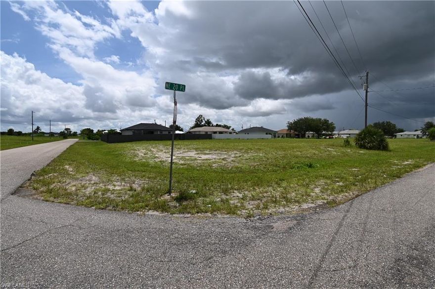 Beautiful corner lot with more than 10,500 sq ft close to Pine Island Rd. Quick access to everything there is like restaurants, shopping centers, Lee Health System, home improvement stores and much more. Build your dream home in a neighborhood that will soon have city water and save the money for a well and septic system. Short ride to Del Prado Blvd to the west and US41 and North Fort Myers to the east.