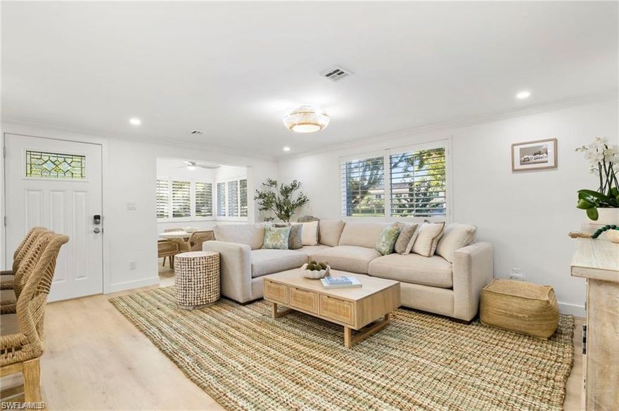 Experience coastal luxury at its finest in this beautifully renovated 2-bedroom, 2-bath condo, perfectly situated in one of Old Naples’ most coveted neighborhoods. Just moments from pristine Gulf beaches, 5th Avenue South dining, boutique shopping, and world-class entertainment, this residence blends modern elegance with timeless Naples charm. Step inside to discover a bright, open-concept floor plan featuring brand-new luxury finishes throughout. The gourmet kitchen showcases custom cabinetry, quartz countertops, stainless-steel appliances, and a spacious island ideal for entertaining. The living and dining spaces flow seamlessly, enhanced by recessed lighting, wide-plank flooring, and abundant natural light.