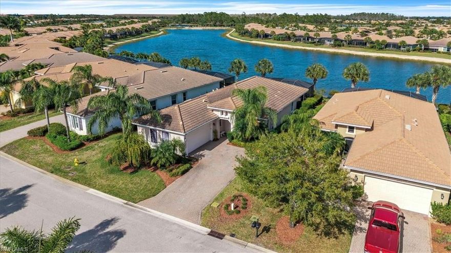 Exceptional WCI built Florencia model which is one of the best selling floor plans in the highly sought after neighborhood of Carena in Pelican Preserve-award winning adult lifestyle living community. This home offers 2 Bedrooms plus a large Den, 2 baths, 2 car garage, formal dining, a large open family room and kitchen with a pool and completely turnkey.  Sellers have lovingly cared for home and put lots of great upgrades which included crown molding throughout, diagonal tile, additional cabinets in the kitchen, and a large area under roof in the Lanai. The coastal motif of this home creates a serene and relaxing atmosphere, transporting you to a beachside retreat. Flooring is tile in main areas and hardwood  n primary bedroom and den. Additional features include custom cabinets in laundry, garage with electric over head racks, New installed HVAC '2025.  Spacious kitchen includes stainless steel appliances, pull out drawers in cabinet includes custom shelving and extra lightings, full height pantry closet. Enjoy all the amenities, social activities, pools, pickleball, tennis, arts & crafts classes, bocce ball and more. The outdoor space provides a great view of the lake and is perfect for entertaining friends and family or simply relaxing with you favorite beverage. Come see why Pelican Preserve is the community of choice in Lee County for those seeking an active lifestyle. Pelican Preserve has over 70,000 square feet for all types of planned activities. Close proximity to the RSW airport and Gulf Town Center for shopping.