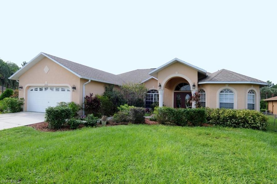 Charming, well maintained home with a great entryway through beautiful double doors that lead to a home with high ceilings and lots of light. The kitchen has granite counter tops and all stainless steel appliances (stove, dishwasher, microwave, and garbage disposal - all recently purchased). The home boasts a split bedroom floor plan that gives you and your guests/children the ultimate in privacy. This home features an oversized master suite and a 13x9 sitting room (can be used as a nursery) with coiffure ceiling and crown molding together with a walk-in closet for her and a double sized closet for him. both bathrooms have upgraded tile. Maintenance free floors throughout with custom 20 inch tile installed on the diagonal. The house sits on 1.14 acres with lots of room for your family to grow and your guests to relax. This one won't last!