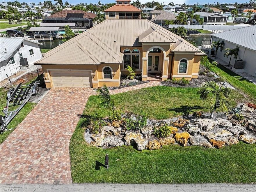 Highlights: Over 100 feet of brand-new composite dock & pilings • Dual 14,000 lb boat lifts • Fully furnished, turnkey • Never flooded • Expansive outdoor entertaining area • Quick Gulf access

Welcome to your island escape at 3656 Emerald Ave in the heart of St. James City on beautiful Pine Island—where the pace slows down, the sunsets feel a little brighter, and life revolves around the water.
From the moment you arrive, you’ll feel the easy rhythm of true island living. This waterfront retreat is designed to enjoy the coastal lifestyle to its fullest, whether you're heading out for an early-morning fishing trip or gathering with friends as the sky turns shades of orange and pink over the water.
Step outside and you’ll discover what truly makes this property special, with over 100 feet of brand-new composite dock stretching along the waterfront, complete with two new 14,000lb boat lifts so your boats are always ready for adventure. With quick access to some of Southwest Florida’s most incredible fishing and boating waters, days spent exploring the surrounding islands, sandbars, and the open waters of the nearby Gulf are simply part of everyday life here.
The expansive outdoor entertaining area poolside invites you to relax, grill fresh-caught fish, host sunset cocktails, or simply unwind while watching boats drift by. It’s the kind of space where memories are made—barefoot evenings, salty breezes, and laughter carrying across the water.
Inside, the home is being sold fully furnished, allowing you to step right into the island lifestyle from day one. Light-filled living spaces create a welcoming atmosphere that feels both comfortable and coastal, making it the perfect retreat after a day on the water. Featuring an open floor plan with 2 bedrooms with pool access and a third bedroom for all of your guests. The master ensuite bathroom has a deep soaking tub, large walk-in shower, dual sinks, and dual walk-in closets for the perfect coastal retreat.  The second bath has pool access, making it easy to transition from boating and the pool to being ready for all that Saint James City has to offer. 
For added peace of mind, the home has never flooded, offering confidence along with its incredible waterfront setting. 
Tucked into the charming community of St. James City, you’re just moments from local marinas, waterfront restaurants, and the laid-back island culture that makes Pine Island so beloved. Here, neighbors wave as they pass by the boat, fishing stories are traded at sunset, and every day feels a little like vacation.
If you’ve been dreaming of a place where boating, fishing, and waterfront living come naturally, 3656 Emerald Ave is more than a home; it’s your gateway to island life.