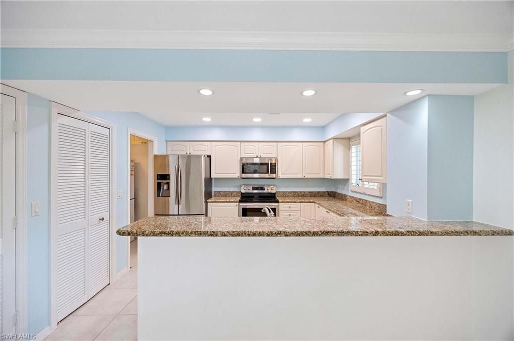 Photo of 1608 Spoonbill LN #B, NAPLES, FL 34105 (MLS # 225083281)