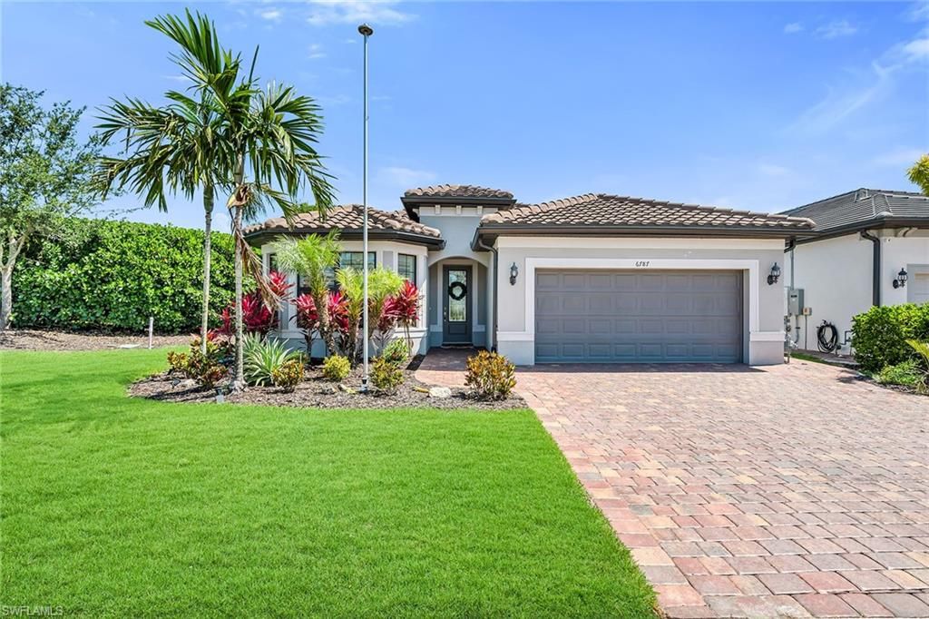 Photo of 6787 Pennyroyal DR, NAPLES, FL 34114 (MLS # 226017662)