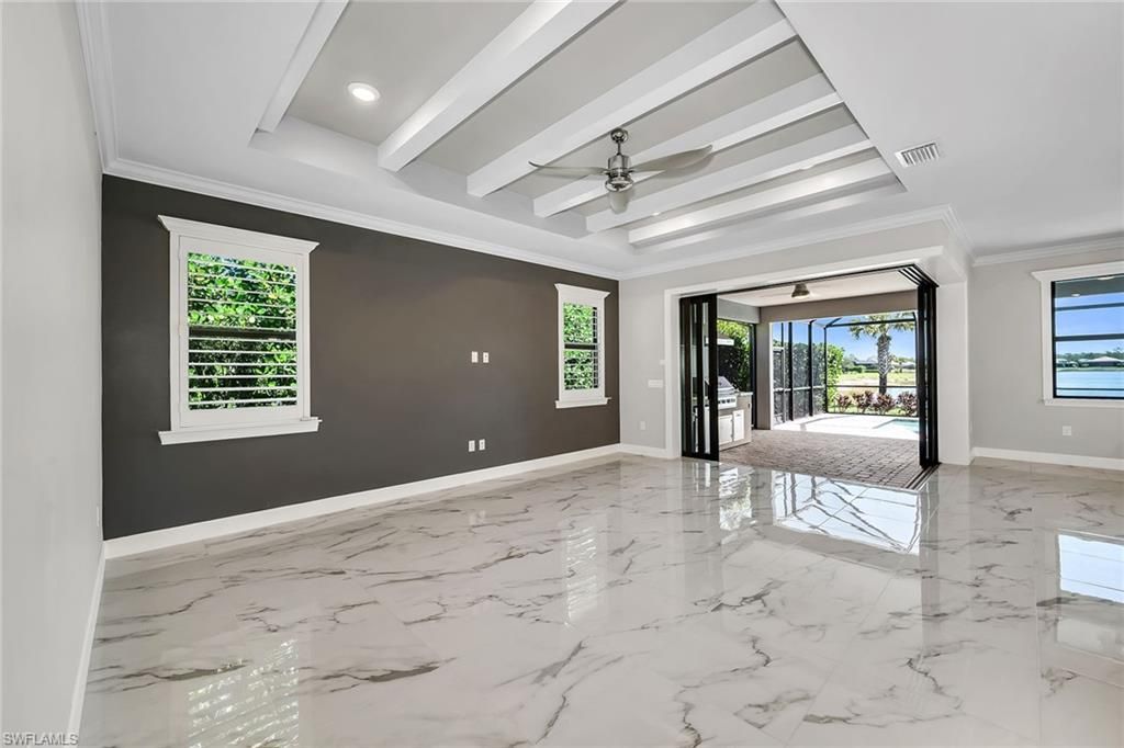 Photo of 6787 Pennyroyal DR, NAPLES, FL 34114 (MLS # 226017662)
