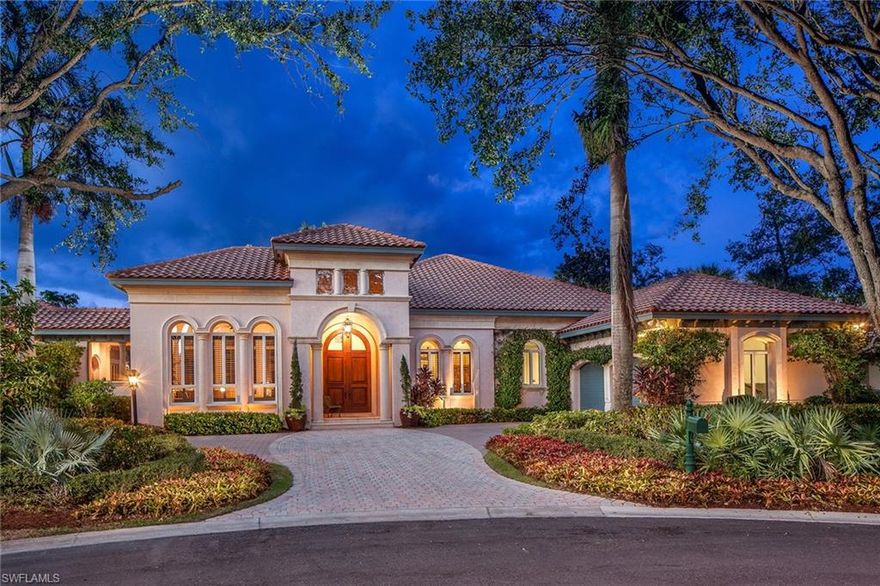 Magnificent architecture and elegant style combine to make this a one-of-a-kind residence for entertaining or family gatherings. It is perfectly situated on a quiet prime interior street near the clubhouse with views of 13th fairway and lake. The heart of the home is a 2,600-square-foot lanai with circular pool and spa, criss-cross stone deck, stone columns, and huge covered lanai with 14-foot high wood ceilings, two-way fireplace and large dining and sitting areas. Gorgeous finishes and stylish decorative touches throughout. Bright and flowing open floor plan provides courtyard views from most rooms. Beautiful cook's kitchen has gas cooktop, huge glazed cream center island, stunning 42-inch dark maple cabinetry with glass fronts, pullouts and paneled appliances. Relax in the family room with pocket sliders to the courtyard and peaceful rear lanai with golf and lake views. There are dual offices, both with views. Rich built-in cabinetry and timeless dining room is designed around antique Mizner table. Collier’s Reserve is one of Naples most pristine golf course communities with over 450 acres of 224 homes, two miles to Vanderbilt Beach and Mercato.