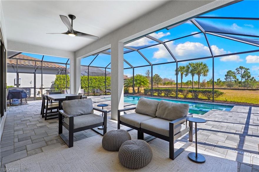 SPACIOUS “SANDHILL” MODEL WITH SPECTACULAR POOL AND SPA, PRIVATE PRESERVE VIEWS AND HUGE BACKYARD, IS AVAILABLE NOW IN THE PLACE AT CORKSCREW! This 2-Story Residence, built in 2022 by Pulte Homes, features 4 Bedrooms + Den + Loft, 3 Full Baths, Powder Bath, 2 Car Garage, 3,238sf Living area. Embrace the best of Florida living with this home’s versatile indoor/outdoor living spaces. The Extended Covered Lanai has a privacy wall with PLUMBING, ELECTRICAL, AND VENT ROUGH-INS for an Outdoor Kitchen. The HEATED POOL and FLUSH SPA is surrounded by a SEALED PAVERED DECK providing a perfect space for entertaining friends and family, lounging in the sun, or relaxing after a long day at work. The area behind the pool measures approximately 52' x 68' x 52' x 100'... a huge space to add a fence for the kids and/or pets, as well as additional landscaping if desired. As you enter the home, you immediately notice the IMMACULATE CONDITION. The downstairs provides living and entertaining space, while all the bedrooms are upstairs. The first floor has a farmhouse feel with all wood-look vinyl flooring throughout along with PLANTATION SHUTTERS. The Den showcases two large windows that let in a ton of light. Beyond the Den is the Formal Dining Space elegantly accented by a designer chandelier. The CHEF’S KITCHEN features White Cabinetry with Carrara Style QUARTZ Countertops, STAINLESS APPLIANCES, white subway HERRINGBONE BACKSPLASH accented by UNDERCABINET LIGHTING, and joined by an area for a Butler’s Pantry. The Kitchen is connected to the casual dining space and living room enhanced by the 2 SETS OF GLASS SLIDING DOORS (1 is a Pocketing Slider) that opens to your outdoor space. Downstairs is complete with a designer inspired powder bath by the garage. Upstairs you'll find new Berber carpeting throughout for a cozy feel. The PRIMARY SUITE features a TRAY CEILING and is accompanied by an OVERSIZED SITTING AREA and WALK IN CLOSET. The PRIMARY BATH is appointed with QUARTZ countertops, Dual Sinks, HEAVY GLASS ENCLOSED SHOWER, private water closet and linen closet. The Primary Suite is joined by 3 Guest Bedrooms, 2 Full Baths, Loft and Laundry. Home is equipped with IMPACT WINDOWS AND DOORS. THIS PROPERTY IS HIGH AND DRY AND LOCATED IN FLOOD ZONE X... NO FLOOD INSURANCE REQUIRED! The amenities at The Place at Corkscrew are second to none!... Resort Pool w/100' Waterslide & Spa, Indoor Restaurant and Bourbon Bar, Cafe, Outdoor Bar, Fitness Center, Movement Studio, Tennis, Pickleball, Bocce, Basketball, Playground, Dog Park, Childwatch, Spa Services, 2 Entry Gates. Just Minutes to Schools, Shopping, Restaurants, Airport, Beaches. For GOLF ENTHUSIASTS, the highly rated Jack Nicklaus designed OLD CORKSCREW GOLF CLUB is open to the public and located across the street from the community! NEW PUBLIX GROCERY STORE PLAZA, JUST 1.4 MILES AWAY! OTHER TENANTS INCLUDE DUNKIN DONUTS, UPS STORE, LEGNO ITALIAN RESTAURANT, NAIL SALON, DENTAL OFFICE, AND MORE!