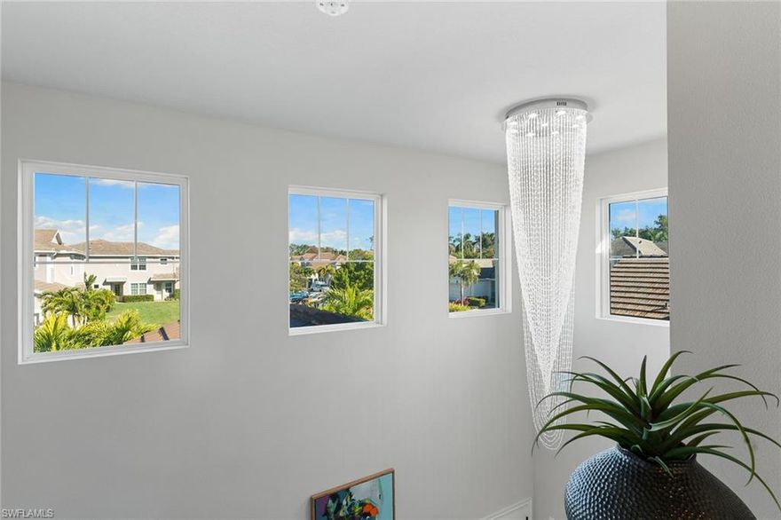 Experience life at Arboretum, a modern coastal community ideally in Naples' thriving Bayshore Arts District, an energetic, accessible neighborhood celebrated for its creative spirit, acclaimed dining and coastal charm. Just moments from the Naples Botanical Garden, Naples Pickleball Center with 64 courts and convenient grocery shopping, this location also offers quick access to iconic 5th Avenue South and Naples world-class beaches. Thoughtfully curated with a refined aesthetic, this bright and spacious end-unit is filled with natural light and features premium, contemporary appliances, a large quartz island, designer-selected fixtures and sophisticated details throughout. Enjoy peaceful mornings and sunset evenings on the screened lanai overlooking the Botanical Gardens, ideal for coffee or cocktails. A two-car garage with epoxy flooring completes the residence. Ideal for year-round living or seasonal enjoyment, this villa offers a rare blend of style, comfort and location.