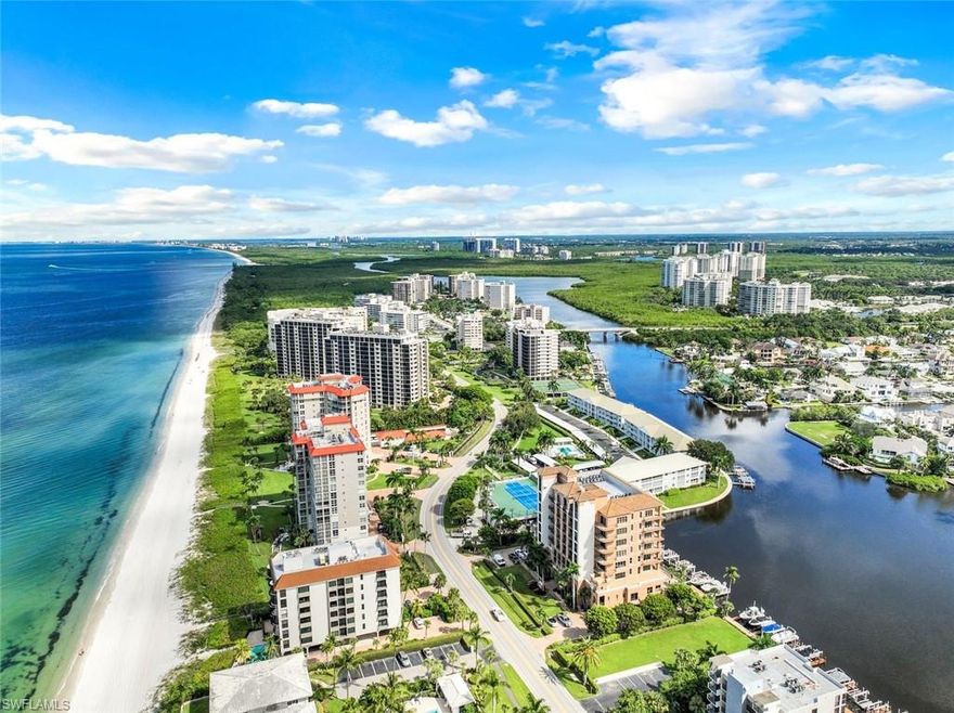 This stunning condo is located in the Beachcomber, a boutique building situated in the sought-after Vanderbilt Beach area. With its prime location, you'll be just steps away from the white sand beaches and turquoise waters of the Gulf of Mexico.The light and bright open floor plan creates an inviting and spacious atmosphere, perfect for entertaining. The condo features plenty of outdoor space, including 3 open terraces and a sunset patio. Large Master Bedroom, which boasts two walk-in closets. Enjoy views of the Gulf and Vanderbilt Bay from every room. Bonus; a private garage and two parking spaces. A secure building with a lobby that offers a guest suite and fitness room. Access to your own boat dock with a lift, providing you with easy access to the Gulf. With beach access just steps away, you'll be able to enjoy the sun, sand, and surf of the Gulf of Mexico. Conveniently located within walking distance of the Ritz Carlton and just a short ride to Mercato and Waterside Shops, providing you with endless options for dining, shopping, and entertainment. This Beachcomber condo is a must-see for anyone looking for to enjoy coastal life on the bay.