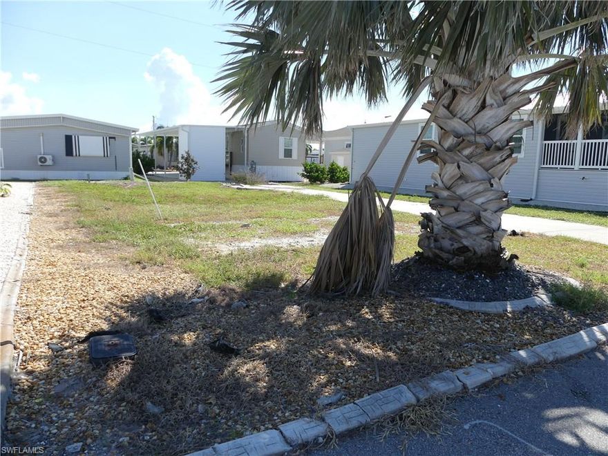 Ideal location.  This lot is only four lots away from the clubhouse, pool, and boat ramp.  You can walk to all of these very quickly.  The community has many amenities.  Boat ramp, clubhouse, pool, hot tub, bocce ball, pickle ball, dog park, picnic area, and boat or motorhome storage for just $50 a year.  Mobile was demolished so big savings on impact fees.