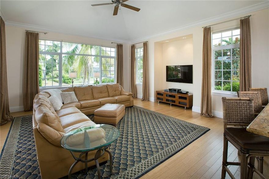 Within walking distance to the white sand beaches of the Gulf of Mexico, this waterfront, single family home provides the homeowners with endless boating and beaching possibilities. Offering multiple living spaces with hardwood flooring, the home is ideal for entertaining or a busy family’s lifestyle. The kitchen opens to the family room and pool beyond with water views. Three bedrooms on the first floor and a fourth and loft on the second floor offer privacy for homeowners and guests. A full outdoor kitchen, pool, spa and dock provide everything needed to enjoy the Naples lifestyle. The kitchen features granite countertops, glass-fronted cabinets and a six-burner gas range. A spa-like master bath and generous master suite is a perfect retreat. Conveniently located to nearby Third Street South and Downtown Naples for shopping and gourmet dining.