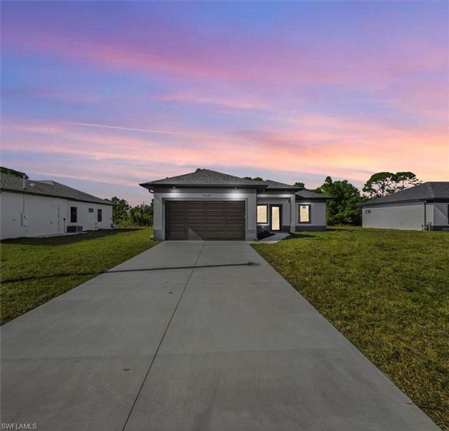 Discover this beautiful brand-new home offering more than 1,200 sq. ft. of luxurious living space.This home features 3 bedrooms and 2 full baths. Inside, you'll find stylish tile flooring throughout, impact-resistant windows and doors, and an upgraded appliance package. The lanai is perfect for enjoying your morning coffee or evening cocktail while overlooking the landscaped yard. Entertaining is effortless in the chef's kitchen that is adjacent to the dining area. The dining area, featuring sliding doors to the lanai, is ideal for get-togethers with family and friends. The primary bedroom suite offers spacious walk-in closets, dual sinks and a walk-in shower. The 2-car garage provides ample storage space. This home exemplifies comfort, style, and quality living.