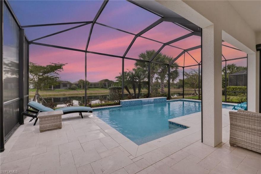 WESTERN LAKEFRONT SUNSETS, a CUSTOM SALTWATER POOL, and an EXTENDED SUMMERWOOD FLOOR PLAN with 11-FOOT CEILINGS and MODERN COASTAL FINISHES — this home truly SHOWS LIKE A BRAND-NEW MODEL.
Perfectly positioned on a PREMIUM LAKEVIEW HOMESITE in Bridgetown at The Plantation, this beautifully maintained residence offers 3 BEDROOMS + DEN, 2 FULL BATHS, & 2,177 SQFT OF OPEN SINGLE-STORY LIVING designed for both comfort and entertaining.
A MODERN GLASS ENTRY DOOR welcomes you inside where natural light fills the foyer and SOARING 11-FOOT CEILINGS create an immediate sense of space. The main living areas and den feature WOOD-LOOK PLANK TILE FLOORING, while 8-FOOT INTERIOR DOORS WITH UPGRADED COASTAL TRIM elevate the home’s clean, modern aesthetic. The EXTENDED GREAT ROOM provides additional living space beyond the standard model and is highlighted by a COFFERED CEILING WITH CUSTOM WOOD SHIPLAP DETAIL.
The kitchen is designed for everyday living and entertaining, centered around a LARGE QUARTZ ISLAND WITH BUILT-IN CABINETRY. WHITE CABINETRY WITH MODERN BLACK HARDWARE, a STYLISH BACKSPLASH, and STAINLESS STEEL APPLIANCES including a BUILT-IN MICROWAVE and ELECTRIC COOKTOP WITH HOOD VENT complete the space. Additional highlights include a SINGLE-BASIN BLANCO SINK and STEP-IN CORNER PANTRY.
The spacious PRIMARY SUITE features a TRAY CEILING, WATER VIEWS, and room for a king-size bedroom set. The ENSUITE BATH includes QUARTZ COUNTERS, DUAL SINKS, FRAMELESS GLASS WALK-IN SHOWER, and a LARGE WALK-IN CLOSET. Two guest bedrooms share a nearby bath with QUARTZ COUNTERS and a TUB-SHOWER COMBO.
The DEN WITH SLIDING BARN DOORS offers a flexible space ideal for a HOME OFFICE, MEDIA ROOM, OR FLEX SPACE.
Outdoor living is what draws people to Southwest Florida and this home delivers! The EXTENDED LANAI WITH TRAVERTINE PAVERS overlooks the lake and showcases a CUSTOM SALTWATER POOL WITH SUNSHELF & BUBBLERS plus a RAISED FEATURE WALL WITH WATER FOUNTAINS — the perfect setting for relaxing evenings and unforgettable sunset views. The lanai is also equipped with STORM SMART HURRICANE SCREENS that close with the push of a button.
Additional highlights include a LAUNDRY ROOM WITH WASHER & DRYER plus a BUILT-IN BEVERAGE BAR WITH GRANITE COUNTERS, SHELVING, & BEVERAGE COOLER, as well as a 2-CAR GARAGE WITH EPOXY FLOORING.
Located in FLOOD ZONE X (LOWEST FLOOD RISK — FLOOD INSURANCE NOT REQUIRED), this home is part of the highly desirable Bridgetown at the Plantation community known for RESORT-STYLE AMENITIES including a RESORT POOL & SPA, LAP POOL, FITNESS CENTER, CLUBHOUSE, TENNIS, PICKLEBALL, BOCCE, WALKING PATHS, & A POOLSIDE TIKI BAR. OPTIONAL MEMBERSHIPS are available at the nearby PLANTATION GOLF & COUNTRY CLUB.
Ideally located just minutes from RSW International Airport, Gulf Coast Town Center, Costco, Target, and JetBlue Park — with easy access to dining, shopping, and entertainment — and only 30–40 MINUTES TO SOUTHWEST FLORIDA’S BEAUTIFUL GULF BEACHES.