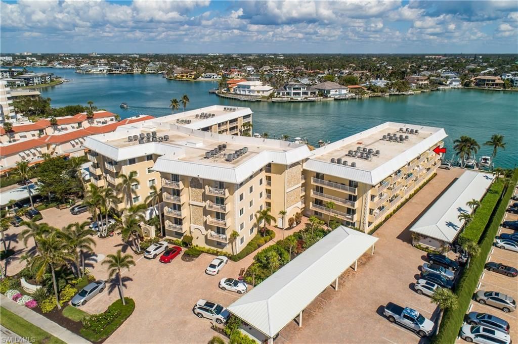 Photo of 3000 Gulf Shore BLVD N #415, NAPLES, FL 34103 (MLS # 225016624)