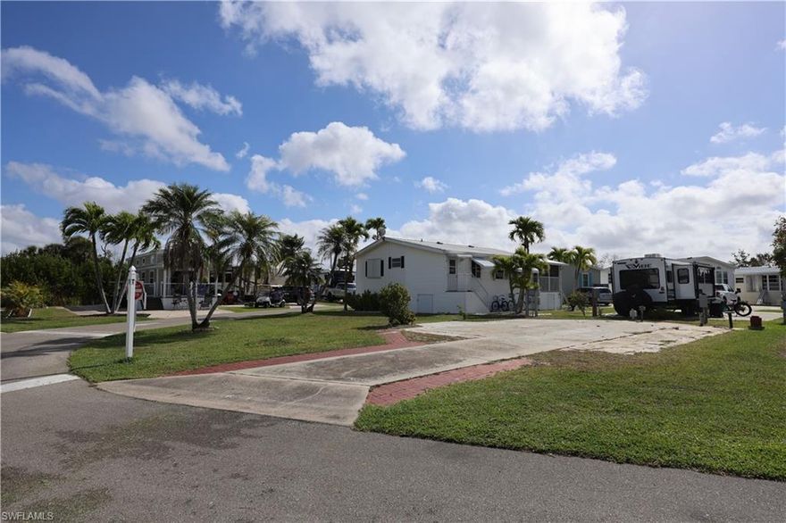 One of the largest pet-friendly corner lots in Phase 5 of Palmetto Palms—offering a rare combination of space, privacy, and flexibility in a highly desirable setting. Located in this sought-after 55+ community where you own the land, this oversized lot stands out with its open layout and added breathing room compared to typical interior properties.
Ideal for an RV, fifth wheel, park model, or future manufactured home, the property is equipped with full electric hookups (50 & 30 amp) for added convenience. The corner location allows for easier access, more usable space, and enhanced privacy, and is conveniently located near community amenities.
Palmetto Palms offers an active and social lifestyle with two pools, a clubhouse, pickleball, tennis, shuffleboard, volleyball, and boat storage, with golf carts welcome throughout the community. Located just minutes from Bunche Beach, Fort Myers Beach, and Sanibel Island, you’ll enjoy quick access to boating, dining, shopping, and stunning Gulf Coast sunsets.
A rare opportunity to own a spacious, well-located lot in one of Southwest Florida’s most desirable RV communities.