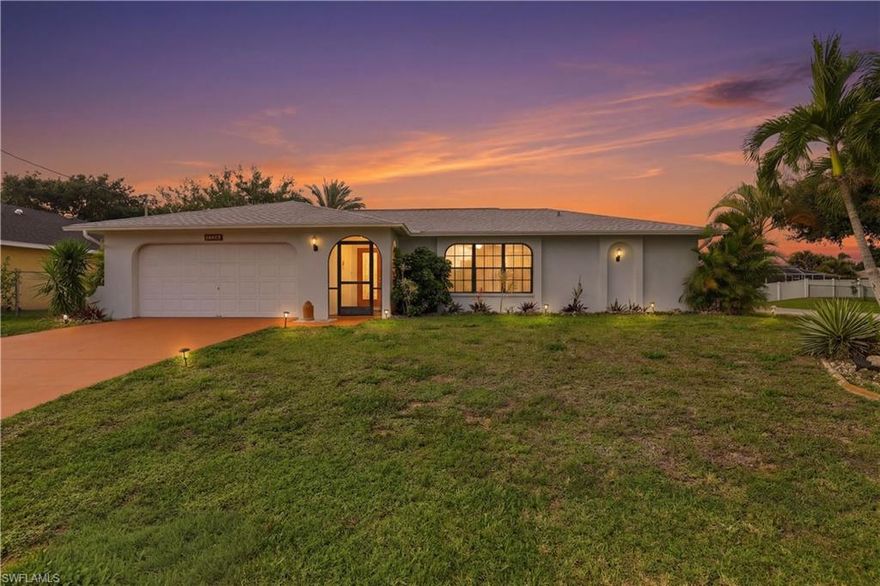 Welcome to your slice of Southwest Florida living! Where the sun lingers a little longer and the backyard becomes your private escape.  Perfectly positioned on a large corner lot with coveted southern exposure, this meticulously maintained 3-bedroom, 2-bath home offers more than just updates. It offers space, privacy, and a presence you can’t replicate. A corner lot like this? That’s a quiet luxury… more breathing room, more yard, and fewer neighbors peeking into your business. Step inside and you’re greeted with sleek tile flooring flowing through the main living areas, leading you into a beautifully updated kitchen that anchors the home with both style and function. Whether it’s a quiet morning coffee or hosting friends for the evening, everything just fits here. But the real story? It unfolds out back.

Slide open the doors and you’re welcomed into your solar-heated pool area, wrapped in a brand-new pool cage (2023) and finished with new patio pavers (2022); the perfect setting for laid-back afternoons or lively weekends. And just when you think you’ve seen it all… the yard keeps going.

Beyond the pool lies an expansive, fully fenced backyard—a rare find—offering plenty of room for pets to roam, kids to play, or to host unforgettable gatherings under the Florida sky. This is where memories get made.

And here’s the part that lets you breathe easy:
***NO FLOOD INSURANCE REQUIRED (Flood Zone X) and ALL ASSESSMENTS PAID.***

Major updates are already handled, including:

NEW ROOF (2023)
NEW POOL CAGE (2023)
FENCE (2022)
POOL PATIO PAVERS (2022)
WATER HEATER (2021)
A/C (2019)

Located just minutes from shopping, dining, and everyday conveniences, this home delivers not just comfort—but confidence.

Whether you're looking for a full-time residence, seasonal retreat, or smart investment—this one checks the boxes and then some. And with a corner lot like this… you’re already ahead of the game. This gem is priced to sell! Come see it for yourself! (Furniture Negotiable).