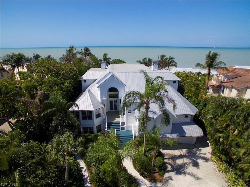 Awesome Luxury Beach Residence located along one of the best areas on Exclusive West Gulf Drive. The view and the setting is one of the best you can find. Fantastic 4 Bedroom Old Fla Style Home with soaring ceilings, spacious floor plan, awesome porch & lanai space,, great room w/fire place, lots of natural light, elevator, impact windows, doors and shutters, hardi-board siding, beautiful pool/spa & landscaping. This is a fantastic property!