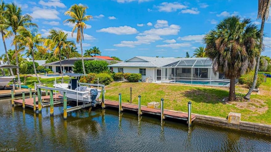 LOWEST PRICE HOME OR LOT IN TOWN AND RIVER!!! Rare opportunity in the highly desirable Town & River boating community! This spacious 4-bedroom, 3-bath waterfront home offers approximately 2,100 square feet under air and is perfectly positioned for the Southwest Florida lifestyle. Designed for boating enthusiasts, the property features direct Gulf access with no bridges and a private dock with quick access to the Caloosahatchee River and the Gulf of Mexico. An oversized garage provides exceptional space for vehicles, storage, tools, and boating gear—an added bonus rarely found in many waterfront homes.
Inside, the home features a generous open living and dining area filled with natural light, creating an inviting space for relaxing or entertaining. The kitchen offers a functional layout with ample cabinetry and a breakfast bar, providing a great foundation for a new owner to update and customize. This property is primed for someone with vision, offering the opportunity to renovate and design the ideal waterfront retreat to match your personal style.
Step outside to your private tropical oasis featuring a screened pool area, perfect for outdoor dining, gatherings, and year-round enjoyment. Whether you're boating, swimming, or simply enjoying the peaceful waterfront setting, this home delivers the true Florida waterfront experience.
Town & River is one of Fort Myers’ most established and sought-after waterfront neighborhoods, known for its wide canals, mature landscaping, and unbeatable location close to beaches, marinas, shopping, dining, Downtown Fort Myers, and RSW International Airport.