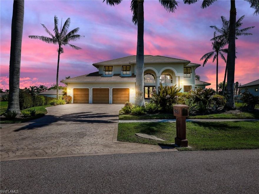 165 feet of waterfront footage! Oversized .54-acre lot, situated in the prestigious ESTATES of Marco Island, this stunning DIRECT GULF ACCESS residence offers timeless elegance, modern upgrades, and a true boater’s lifestyle. It has a private dock featuring two slips and two lifts, making it an ideal haven for boating and fishing enthusiasts. Step inside to a bright, sophisticated interior with soaring ceilings, plantation shutters, custom walk-in closets, porcelain tile flooring, and a timeless brick fireplace feature wall. The open layout flows seamlessly into the chef’s kitchen, complete with a coffee counter, wine cooler, designer cabinetry, and a spacious island designed for entertaining. Upstairs, a versatile loft opens to a wraparound balcony, capturing serene views of the water and the surrounding landscape. Outdoor living is equally impressive, showcasing a newly enhanced lanai with weatherproof cabinetry, panoramic screen enclosure, and a travertine pool deck. At its heart lies a saltwater pool with a peaceful water feature, heated by solar panels for year-round enjoyment. This residence combines luxury with practicality, offering peace of mind through strong construction, designer finishes, and low-cost transferable flood insurance. Experience the rare opportunity to own a home that blends luxury, function, and the very best of island living.