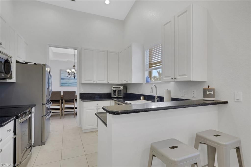 Photo of 1465 Mariposa CIR #201, NAPLES, FL 34105 (MLS # 226013584)