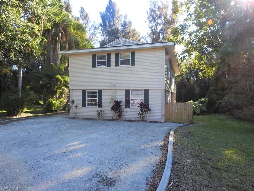 Enjoy Country living with an easy commute to Fort Myers, Cape Coral or Punta Gorda. This 2 story stilt home has been completely remodeled and offers two upstairs bedrooms and a Master Suite on the 1st floor with its own living area and kitchenette. Upstairs Kitchen offers wood cabinetry, solid surface counters and stainless appliances with a breakfast bar and dining area. There is an open living area with French Door access to the oversized wooden deck that looks over the large backyard that has plenty of room for a pool. There is a a storage shed in the back yard with overhead door and the yard has lots of mature foliage to keep your area private and shaded. Easy to show and ready to move in.