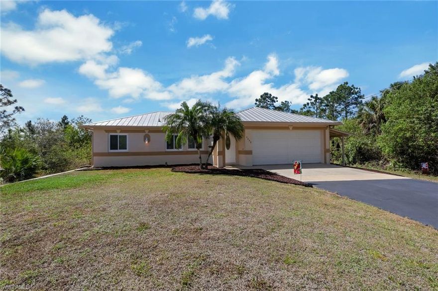 Welcome to this beautifully maintained 3-bedroom, 2-bath single-family home situated on over an acre of land, offering space, privacy, and endless potential! This well-kept property features a recently upgraded METAL ROOF, IMPACT-RESISTANT windows throughout, large updated kitchen w/ breakfast bar & fresh interior paint that gives the home a clean, modern feel. Enjoy the inviting outdoor setting with attractive landscaping and plenty of room to expand, garden, or simply relax. Located in a rapidly developing area of eastern Collier County, this home offers both comfort and future value. Priced to sell! Don’t miss this great buying opportunity in the Naples 34120 area!