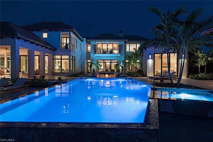 JUST REDUCED 1.5M...THIS HOME IS NOW COMPLETE AND CAN BE SHOWN AT YOUR CONVENIENCE.
Along the southern edge of Hidden Bay, overlooking Man-of-War Cove sits arguably the most sophisticated residence to be built in quite some time. Its safe to say the stars have aligned on this fabulous project as it awaits its would-be owner to call it home. The most serene of settings coupled with its deft design blended with expertly appointed living spaces, it is fair to say that there is a new standard for perfection in Port Royal. Its address: 3750 Rum Row. Stofft-Cooney conceived and drawn, Ficarra Design Associates skillfully enhanced and adorned, and BCB built, the home is synonymous with the highest standards Naples has come to appreciate and revere. Utilizing the western-facing site approaching an acre in size, coupled with over 170 feet of bay frontage, the design team fashioned over 9,500 square feet of masterfully executed living space (over 12,400 total under roof). With six en-suite bedrooms inclusive of the detached guesthouse, the home exudes style, sophistication and refinement.