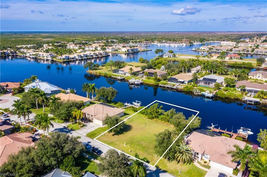 A true BOATERS DREAM!!  Situated off Tamiami Trail E (41) between Everglades City and Naples own Collier Blvd is the hidden gem of Port of the Islands.  Rarely is this type of land available in Naples for this price with direct-no bridge- Gulf of Mexico access. The Cays neighborhood sits on the eastern side of the community where boaters can enjoy the best sunsets, sunrises, boating and the tranquility of nature all around.  This rear north facing lot is a sure bet for great living. Cleared and ready for you to build your dream home with your own private dock for your boat, as a bonus the vegetation between the lot and the canal has been cleared (2020).  While building your new dream home, take a walk or very short drive over to the Port of the Islands Marina where you can store your boat (check with the marina for availability) while waiting for your private dock to be finished and take the time to relax, sit down for a nice dinner at the restaurant and watch the marina come to life.  You also have access to the boat ramp, bait shop/convenience store and trailer parking. Come check it out for yourself and let’s make a deal!