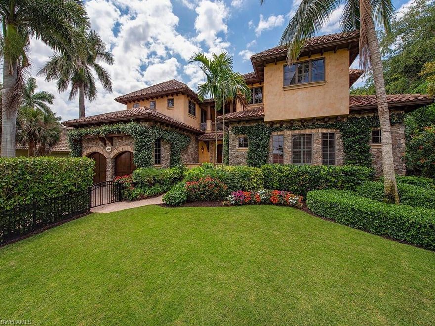 Located in the beautiful neighborhood of Aqualane Shores, this extraordinary waterfront Tuscan styled home is a boating enthusiast and beach lover’s paradise. This home offers five bedrooms with the master suite on the ground floor and three-bedroom en suite quest quarters upstairs with private balconies.  Throughout the first floor you will find french doors that lead out to the lanai which is magnificently landscaped for privacy and includes a sparkling infinity edge pool with spa.  Beautiful interior finishes include cedar wood beam tray ceilings, gourmet kitchen with 30’ granite island, fireplace, 15’ ceilings, stone & hickory floors and much more. A newly constructed boat dock has recently been installed which gives you direct access to Naples Bay and the gulf.  The beach and Third Street South shopping and fabulous restaurants are just a few blocks away.