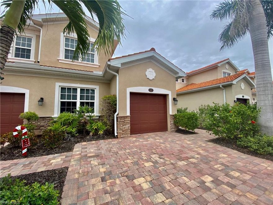 This lovely end unit coach home offers an open-concept kitchen and living space, a private lanai overlooking the lake, an SW exposure, and a one-car garage attached. A Very well distributed Ravello floor plan on the 2nd floor with 3 split bedrooms and an office/den that can easily accommodate guests or family. Some features include impact-resistant windows, tile throughout, a wood floor in the den, and an excellent choice of ceiling fans and lighting—a nicely equipped kitchen with granite countertops, GE stainless steel appliances, and a butler's pantry. Crown molding and blinds in all windows complement this beautiful, maintenance-free home. The community pool and spa is within a very short distance, as well as the exercise room, grills, and bocce court. Sorrento is in an excellent location with easy access to -75, Naples, and many beaches.