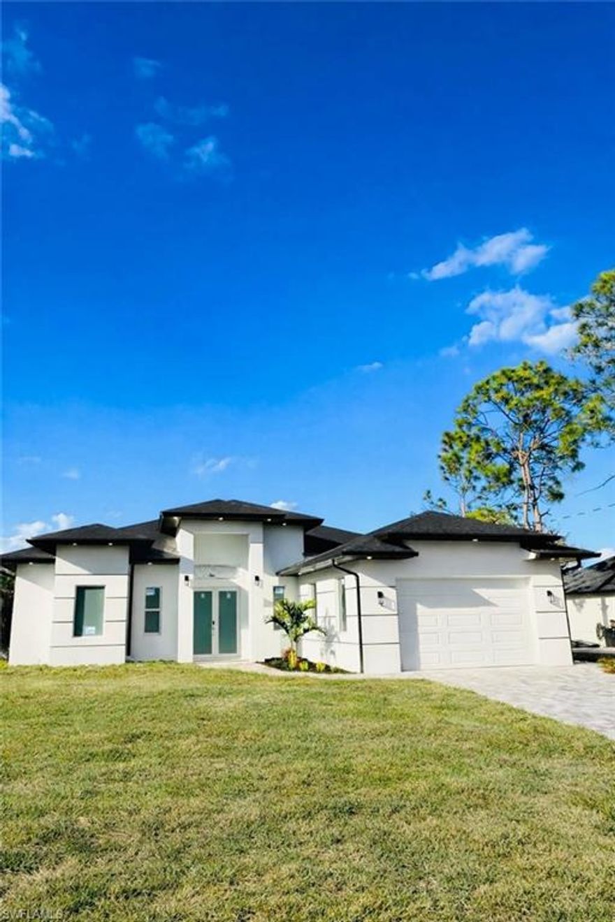 Brand new 3-bedroom, 2-bath home offering nearly 2,000 sq ft of living space in Lehigh Acres. This property features modern finishes throughout, elegant marble flooring, and a thoughtfully designed layout with spacious living areas. Enjoy a large yard perfect for entertaining, relaxing, or future customization. A great opportunity to own a newly constructed home with contemporary style and plenty of outdoor space. for showing information please reach out to the listing agent, or call 7868671789.