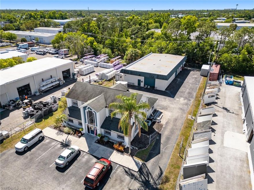 Located in the highly sought-after industrial corridor of Metro Parkway, this property on Arc Way offers unparalleled access to major roadways and is strategically positioned within Fort Myers' rapidly growing industrial sector. Zoned for light industrial use, this site is perfect for a variety of commercial and industrial ventures, including offices with flex space, distribution centers, warehouses, and manufacturing facilities.
The Metro Parkway Corridor serves as a key thoroughfare, ensuring seamless connectivity to both local and regional destinations, with quick access to major highways and Fort Myers' commercial hubs.
The site boasts 100 feet of frontage on Arc Way, with a depth of 302 feet, totaling 30,200 square feet. Water and sewer services are provided to the site by Lee County Utilities. The property features two separate structures. The front building is a two-story structure containing 3,304 square feet of mostly finished office space, while the rear building offers 4,050 square feet of both finished office space and flex space.
This site presents a unique opportunity to establish your business in one of Southwest Florida’s most dynamic industrial zones. Don’t miss out on this prime piece of real estate.