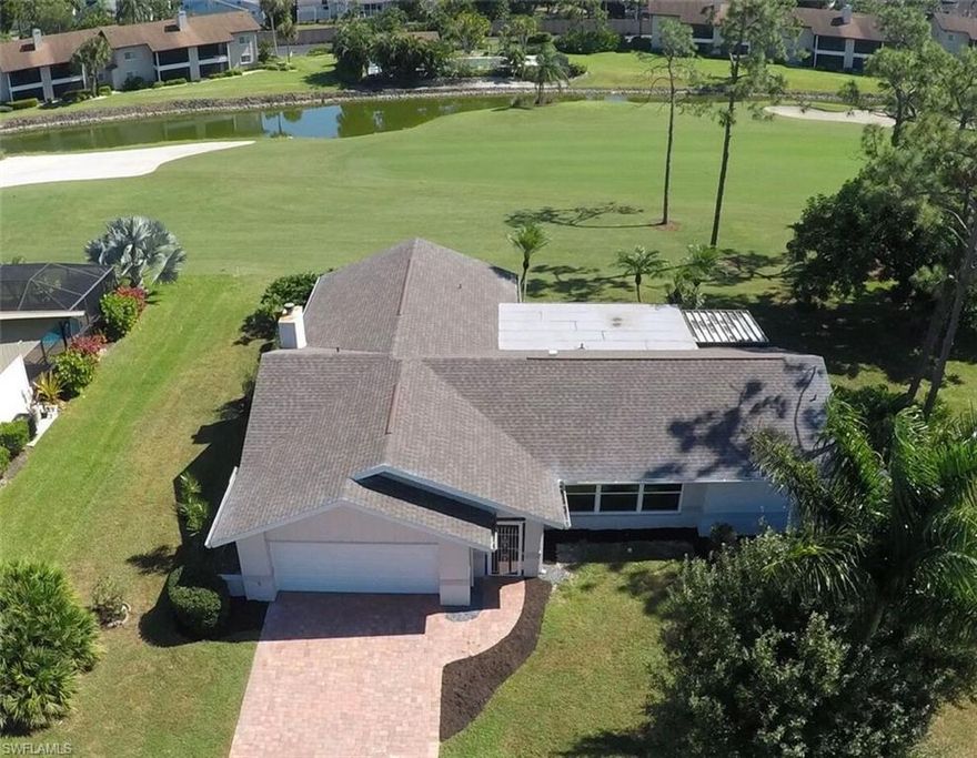 Completely renovated, spacious 3 Bedroom, 2 Bath Home on the Golf Course in The Forest!  Wide open floor plan with a wall of sliders overlooking the screened Lanai and on to the Golf Course.  New ceramic tile plank flooring, all new stainless steel Whirlpool appliances, beautiful granite counter tops.  Step in to the formal foyer and your sight line goes to the open Living Room and Kitchen to the right, and Family Room area with wood burning fireplace to the left along with a built in bar plus wine cooler.  2 Guest Bedrooms and updated Bath are also at this end.  The Master Suite features dual vanities, shower and huge walk-in closet.  The oversized Lanai is accessible from the Family and Living Rooms with full telescoping sliders to open up the whole house! The Forest is an established Golf Community with optional membership - many levels available from Social to full Golf. Lots of amenities - renovated clubhouse, pool, tennis, 36 holes of golf - within a gated, secure neighborhood.  Close to RSW Intl. Airport, colleges, Ft Myers, Estero, beaches, and everything else you could need or want.