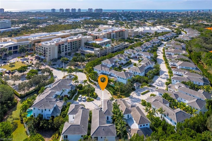 Welcome to Casa Dell'Eleganza!TURNKEY FURNISHED by CLIVE DANIEL! Discover this exquisite residence nestled within a private, gated community of only 44 coastal residences. Every aspect of this stunning residence has been meticulously designed, ensuring a truly unique and elegant lifestyle. The main floor boasts a grand, soaring great room adorned with exquisite woodwork and a remarkable backlit beamed ceiling. The centerpiece is a custom 24-foot Impact Glass Euro Wall, showcasing the sparkling pool and cascading waterfall. With a seamless pocketing design, this wall effortlessly opens, seamlessly merging the indoors with the outdoors. Step out onto the travertine patio, where you'll find a delightful outdoor entertaining area complete w/TV and built-in grill. This serene oasis is perfect for unwinding and enjoying the tranquility of your surroundings. Adjacent to the great room is a dream kitchen that will impress even the most discerning chefs. Custom Rufino cabinetry, a sizable island, and state-of-the-art appliances including a professional steamer, natural gas stove, and wine cooler, this kitchen is a culinary haven. Walking distance to restaurants, shopping and beaches!