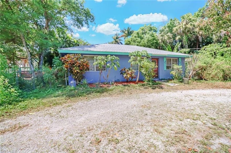 This property is located at the very End of Rose Apple with a shared privacy gate to give you that extra privacy. With a little TLC this property could make your dreams of country living come true. Come see this unique 2 bedroom 1 bath home on a peaceful and private acre of land. There are 2 horse stalls with auto runs right behind the house, feed and tack barn, and 8 more horse stalls located in the backyard. This can be your tropical paradise. There is a private drive around back of property with an easement. Property also qualifies for a rare agricultural exemption. This gem is truly a diamond in the rough! Enjoy quiet and relaxation in the afternoon and enjoy fine dining, galleries, and shopping on Fifth Avenue or Marco Island in the evening that are just minutes away. Conveniently located off of Collier Boulevard between 41 and Rattlesnake Hammock Road. This property offers rare plants and fruit trees and gives one a taste of the old Florida and Naples lifestyle.