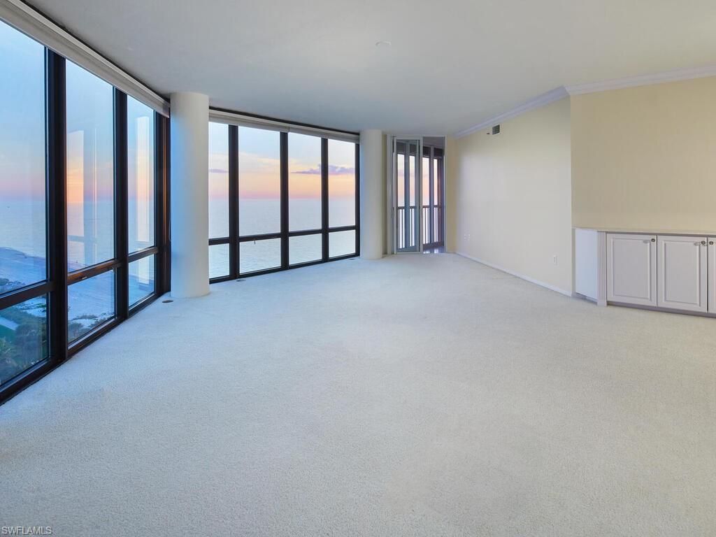 Photo of 4951 Gulf Shore BLVD N #901, NAPLES, FL 34103 (MLS # 225079231)