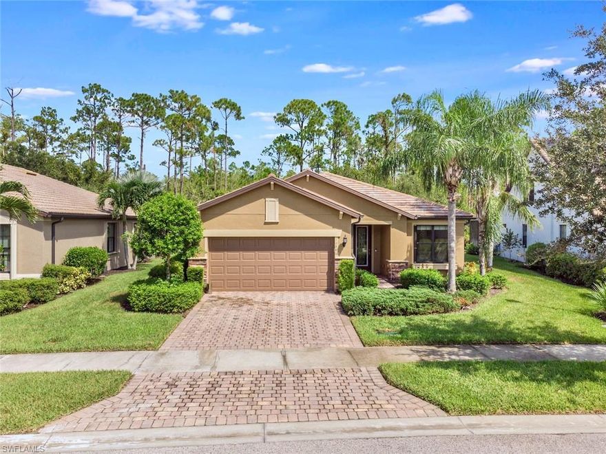 The moment you walk through the glassed etched front door, this "Martin Ray" model is sure to impress with designer touches & upgrades throughout. Open, bright, & well-lit, this 3 bedroom + den, 2 bath preserve home has over 2,100 s/f of living space. Tile flows throughout the main living area & carpet in the bedrooms & den.  Hours will be spent with family & friends gathering in the gourmet kitchen.  Large center island with granite countertops, a butler pantry + large built-in wine rack, oversized walk-in pantry, sleek-looking appliances, & designer stylized backsplash make this the focal point of the home. High-volume ceilings, crown molding + designer interior doors create comfort & space. Outside, the screen lanai has been extended 4' to give you great views of the private preserve. Also, there is ample room for a pool if desired!  Plenty of extra storage in the 4' extended garage + overhead storage rack.  Great storm protection with Storm-Smart rear electric shutters + accordion and manual front door shutters.  AC is 2015, condenser is 2021, hot water tank 2022.  Great amenities in Bridgetown, close to fine dining and shopping, you are now HOME!