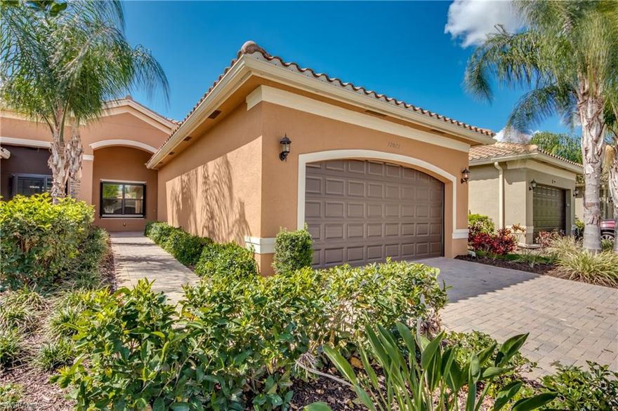 The very popular floor plan called The Nantucket from GL homes in Marina Bay. This home has many builder upgrades. From top of the line granite counter tops in master bathroom with his and her sinks, to your future Kitchen featuring 48" white wood cabinetry and crown molding, and lighting on top and underneath. This amazing Villa backs up to the water with a gorgeous southerly view and huge screened in back lanai. From the minute you walk in through the front foyer you will love enjoy the high ceilings and open floor plan with a formal dining area and a separate den with French doors. Truly split floor plan with Master bedroom in the back of the home and the guest bedroom in the front. Marina Bay is located in the Treeline corridor with quick access and a short drive to I-75, FGCU, Florida Jet-Blue sports park (home to the Boston Red Sox training facility) and the Fort Myers airport. Marina bay has amazing amenities such as resort style pool, lap pool, kiddie water and play park, state of the art gym, indoor basketball and plenty of tennis and pickle ball courts for the avid players!! Call and schedule your showing today!!