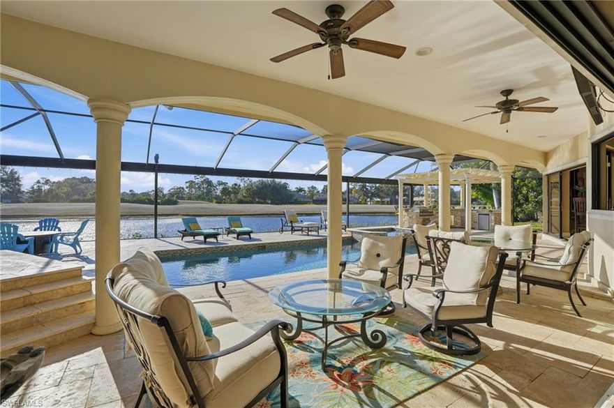 You will not be able to beat the sunsets from this incredibly designed custom estate home in Fiddlesticks Country Club.  Discover an opportunity to own nearly 4,000 sq. ft. of luxury in one of Ft. Myers most coveted neighborhoods.  Impeccably designed with no detail spared, this show-stopping residence blends sophisticated design with effortless functionality.  Step into the heart of the home: an updated chef-inspired KITCHEN with Cherry wood cabinets, Quartz counter tops,  Stainless Steel appliances (brand-new refrigerator and newer dishwasher), warming drawer, Blanco sink and a breakfast bar.  From the volume ceilings and spacious open concept to the sweeping golf course views, timeless architecture meets easy living at its VERY BEST! The floor plan offers a grand PRIMARY SUITE with rich cherry cabinetry, two walk-in closets, double vanities, a huge tiled shower, sun patio with serene pool access & lake to golf course views. The FOUR EN-SUITE BEDROOMS will spoil your guests with comfort and beauty. There is an enormous amount of storage space, a wet bar with WINE COOLER, LED lighting, Travertine tile, recessed electric fire place, built-in floor safe, circular driveway, 2-AC zones, portable generator(included), full house storm shutters and a newer GOLF CART that stays.  Step outside into your 3000 sq.ft. BACKYARD OASIS, designed for year-round entertaining. Enjoy a heated POOL and SPA, OUTDOOR KITCHEN with Pergola cover, Bull Grill, warming drawer, refrigerator, granite tops, 8 bar stools that stay, and a fire pit that invites evenings under the stars—all behind a yard that ensures privacy with ambiance.
This home is located in one of Fort Myers finest low-density country club communities with 36 holes of championship golf, practice facility, clubhouse with fine dining, lighted Har-Tru tennis courts, resort-style pool and cabana area, staffed fitness center, dog park, pickleball and bocce courts. Mandatory membership fee due at closing. Own your own golf cart here. No CDD fees. NO WAIT LIST HERE.