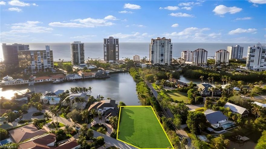 THE LARGEST SINGLE FAMILY LOT IN ALL OF PARK SHORE!  While there is a very nice home on this property the value is most certainly in the land.  Build your grand estate within walking distance to the beach and give yourself the Naples experience the way it was meant to be.  With capacity to comfortably build a more than 10,000 square foot home with long water western views, you’ll proudly own the crown Jewel of Park Shore.  As unique as the building envelope is itself, the location might be even better….  Direct side gate access allows quick walkability to the beach and the Mercato, Waterside Shoppes, and Downtown Naples are all just moments away.   The home currently on the site has been beautifully maintained, features large open spaces, 4 bedrooms and a generous pool area.  Whether you build new or enjoy the home currently in place this is a once in a lifetime opportunity to own a truly special property.