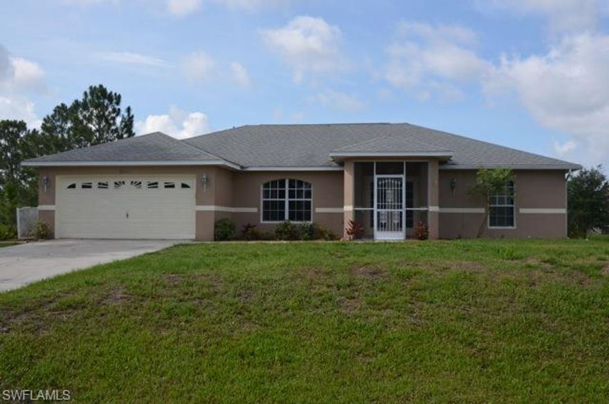 Don't miss this beautifully remodeled 3 bedroom 2 bath split floor plan home with large den. This home boasts diagonally laid tile floors throughout the entire living area, new carpet in all of the bedrooms and den. The interior has been freshened up with a nice neutral color paint job and custom lighting fixtures and fans in all of the bedrooms. The kitchen has upgraded counter tops, crown molding on the cabinets, center island, stainless steel hardware and outlet covers to accent the upgraded stainless steel appliances. Guest bedrooms have large closets and share a jack and jill bathroom with upgraded counter tops. The spacious master has two closets and master bath has separate tub and shower as well as upgraded counter tops. The exterior of the home has fresh new landscaping, screened in tile front porch, and large under truss lanai that overlooks the back yard with plenty of room for a pool! It doesn't stop there along with the exterior trim being repainted, the garage door and front door have been repainted as well. All n a convenient location close to down town Lehigh and Lee Blvd. with easy access to Fort Myers. Make your appointment today to view this move in ready home!