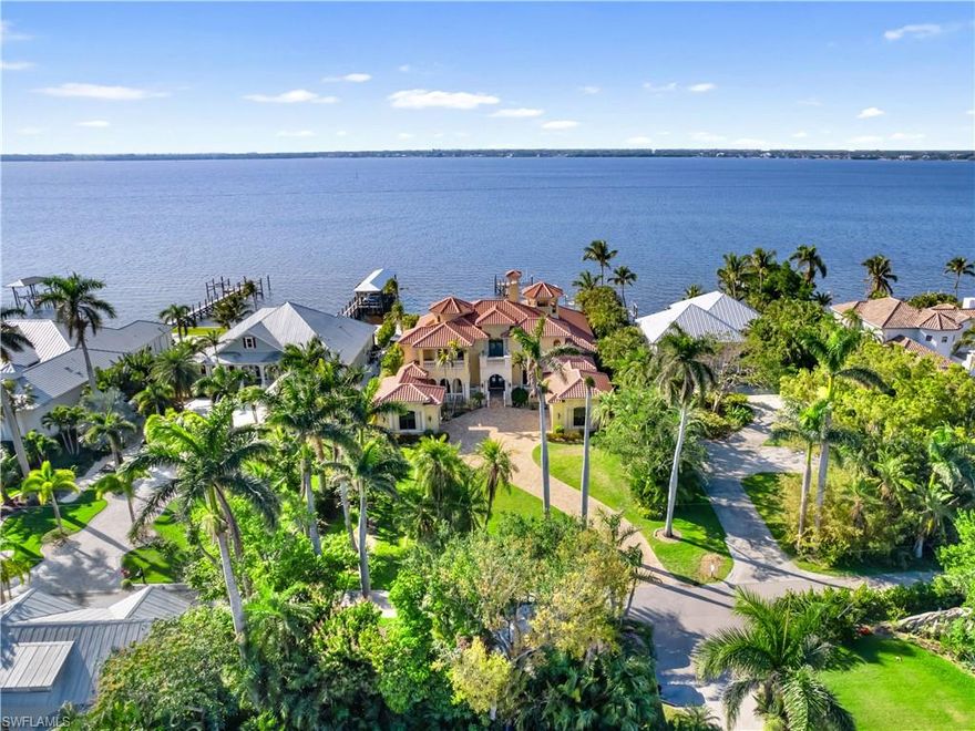 Experience the perfect blend of luxury and warmth in this breathtaking Mediterranean residence along the Caloosahatchee River. Just moments from the historic Edison & Ford Winter Estates and the vibrant downtown Fort Myers, this estate offers over 5,900 square feet of exquisite living space. Designed for both comfort and sophistication, the home features four spacious bedrooms, four full baths, and two half baths, along with elegant fireplaces, an elevator, large 3 car garage and a seperate detached two-car garage and or dedicated man cave. The thoughtfully designed interiors seamlessly blend modern convenience with timeless European elegance, showcasing a formal living room, dining room, library, gourmet kitchen, breakfast nook, family room, media room, and wine cellar. Step outside to a serene oasis perfect for entertaining, with immaculate gardens, fountains, a negative-edge swimming pool, an outdoor pavilion, a pool house with a kitchen, and a rooftop sundeck—all designed to capture stunning sunset views. The new seawall and dock are fully completed, providing direct access to the Caloosahatchee River and delivering the ultimate Southwest Florida waterfront lifestyle.